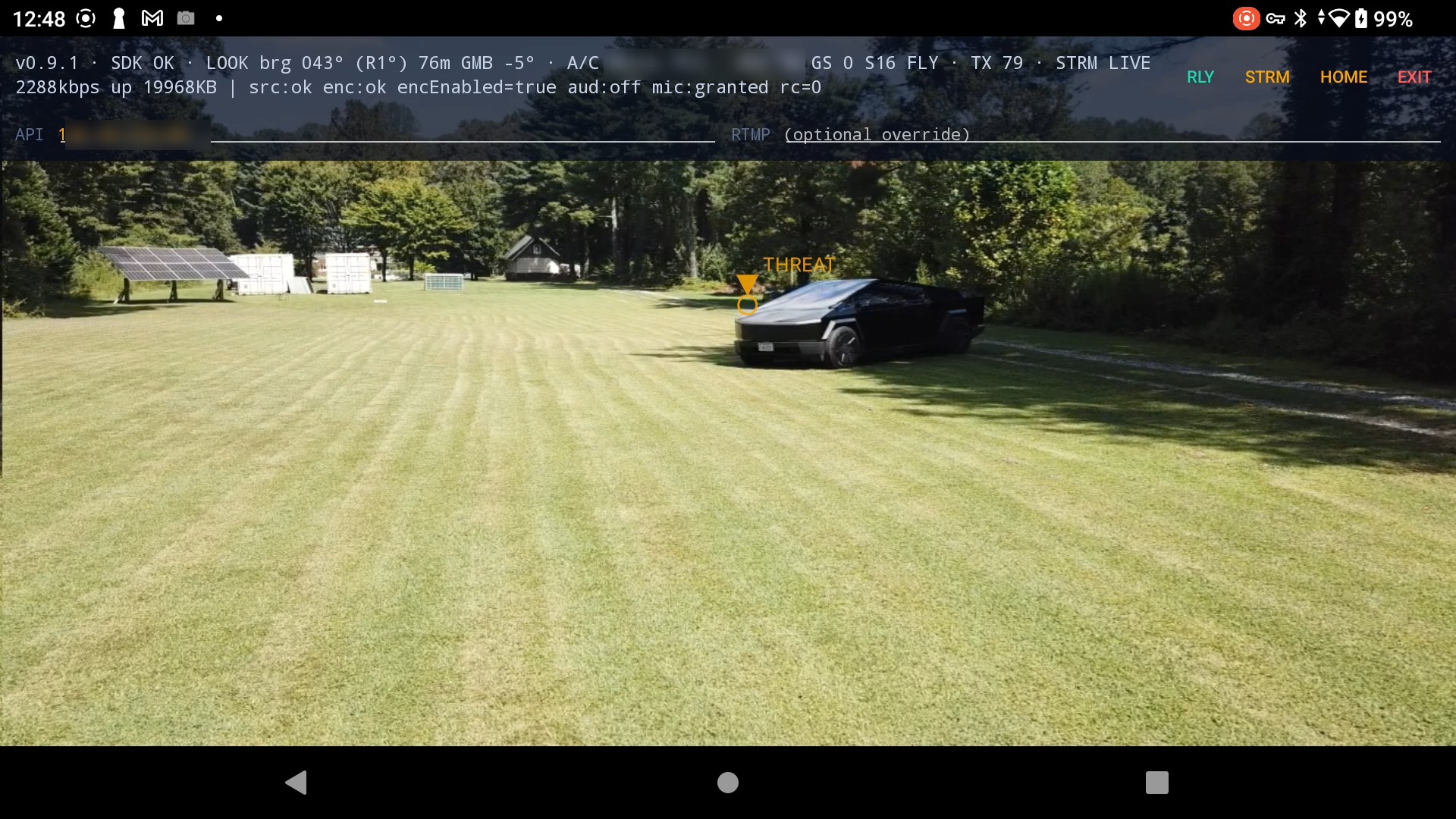 Live video from the aircraft over the proving ground with an on-screen object designation